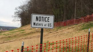 Wotus-sign-at-highway-project-display.jpg