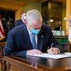 Massachusetts Gov. Charlie Baker signing a landmark climate bill