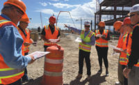 Mike Williams touring airport site