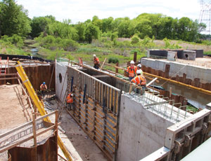 New connections South State, Bridgeton, N.J., builds a bridge structure as part of Contract 201, in Section 2. The entire widening program includes building 60 bridges.